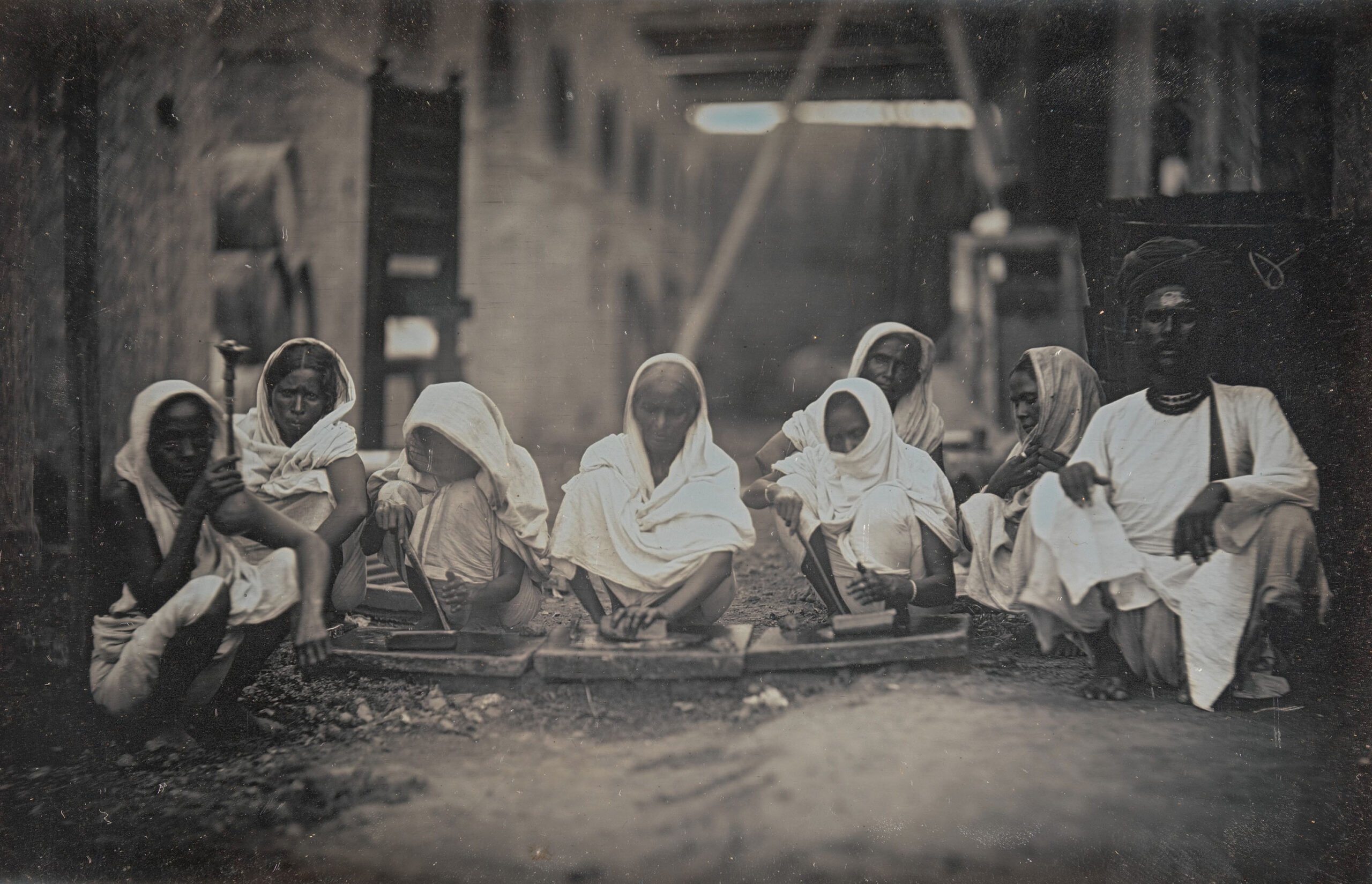 Mid 19th century daguerrotype photograph of women grinding paint