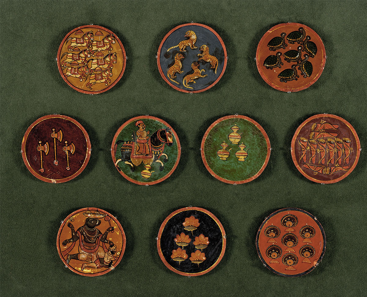 A set of ten Ganjifa playing cards with images of animals, weapons, objects, a human figure and a divine figure.