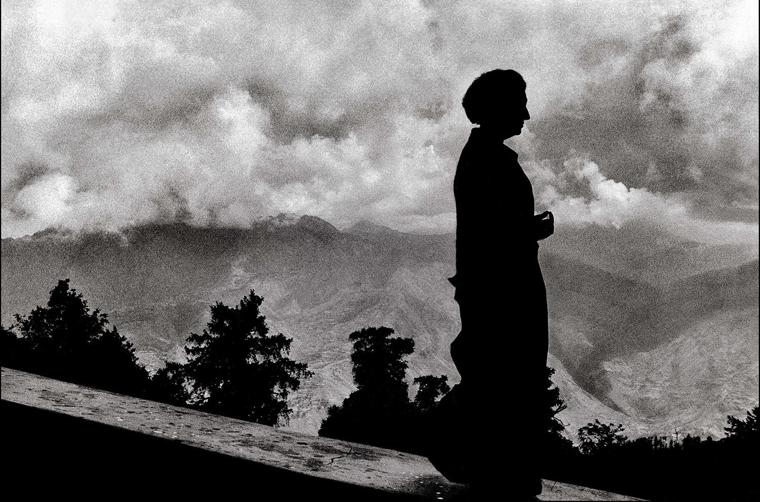 Archival photograph of the silhouette of Indira Gandhi against the Himayalas by Raghu Rai