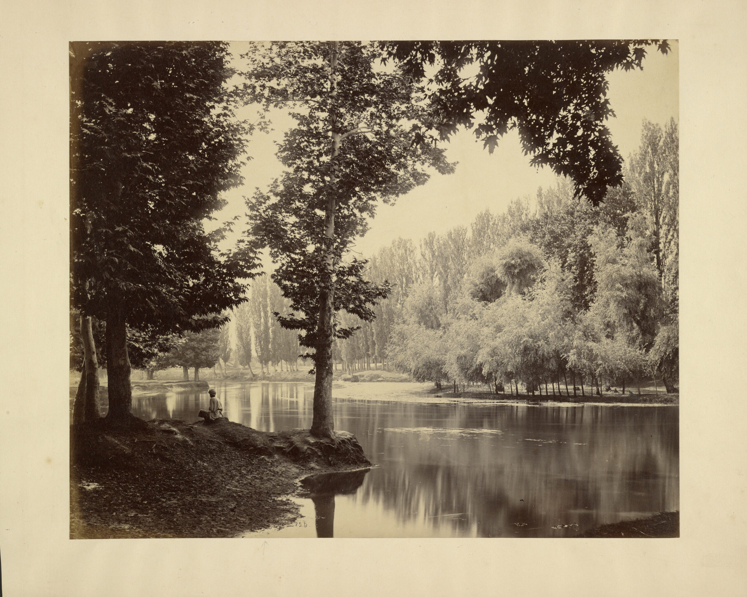 Mid-19th century albumen print of an archival photograph by Samuel Bourne showing the view of a canal in Srinagar, India
