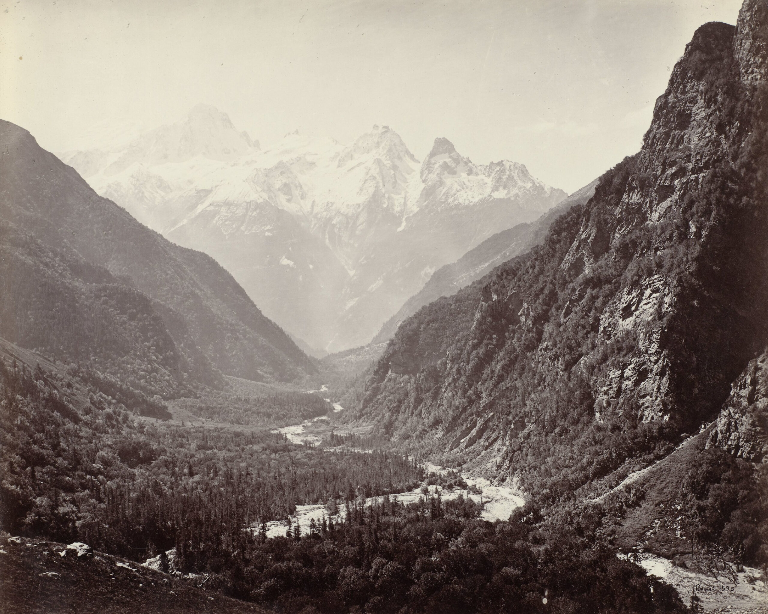 Mid-19th century albumen print of an archival photograph by Samuel Bourne showing the Srikantha peak and the valley below it in Uttarakhand, India