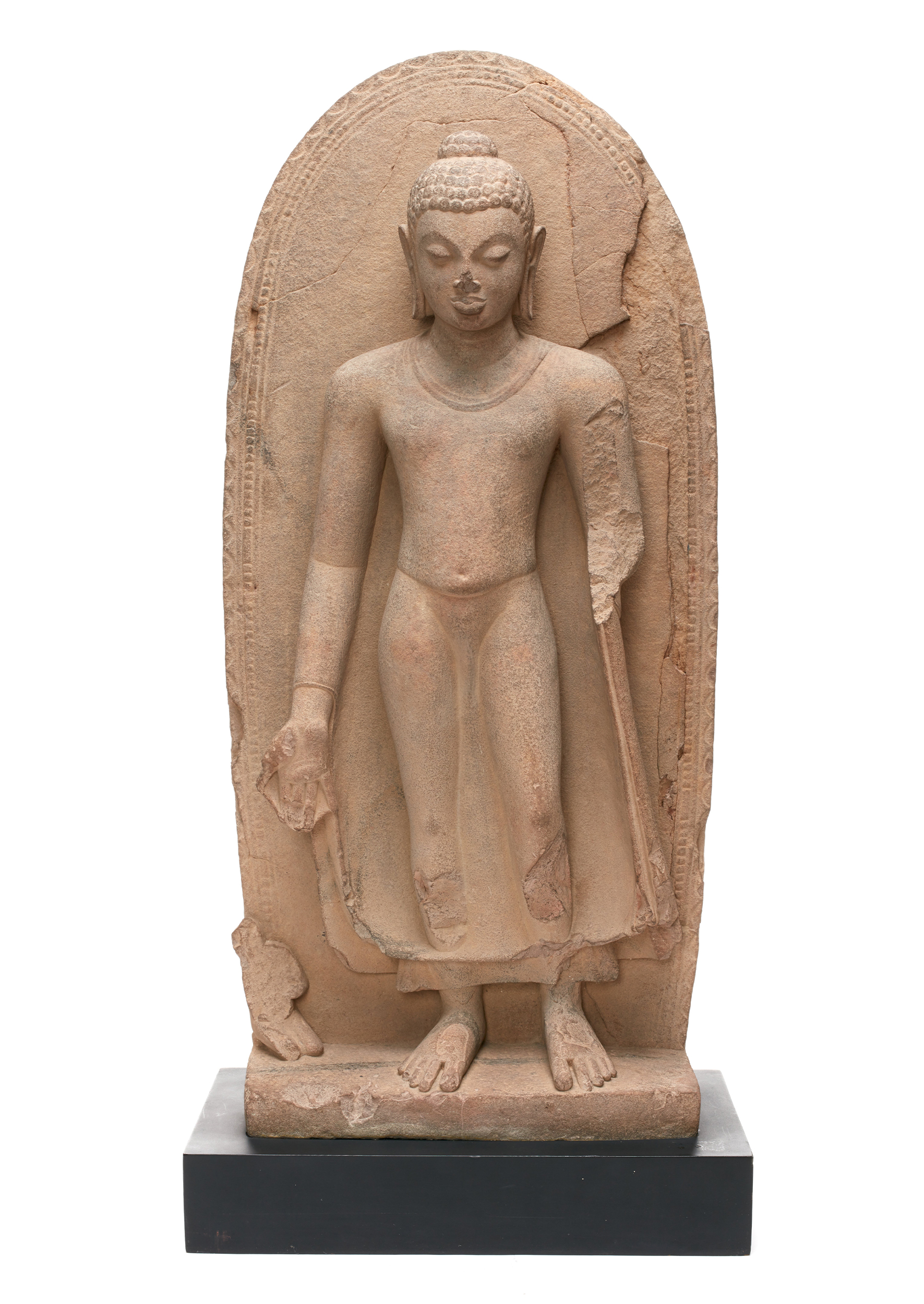 Photograph of a sandstone standing Buddha from the Gupta period with his hands broken