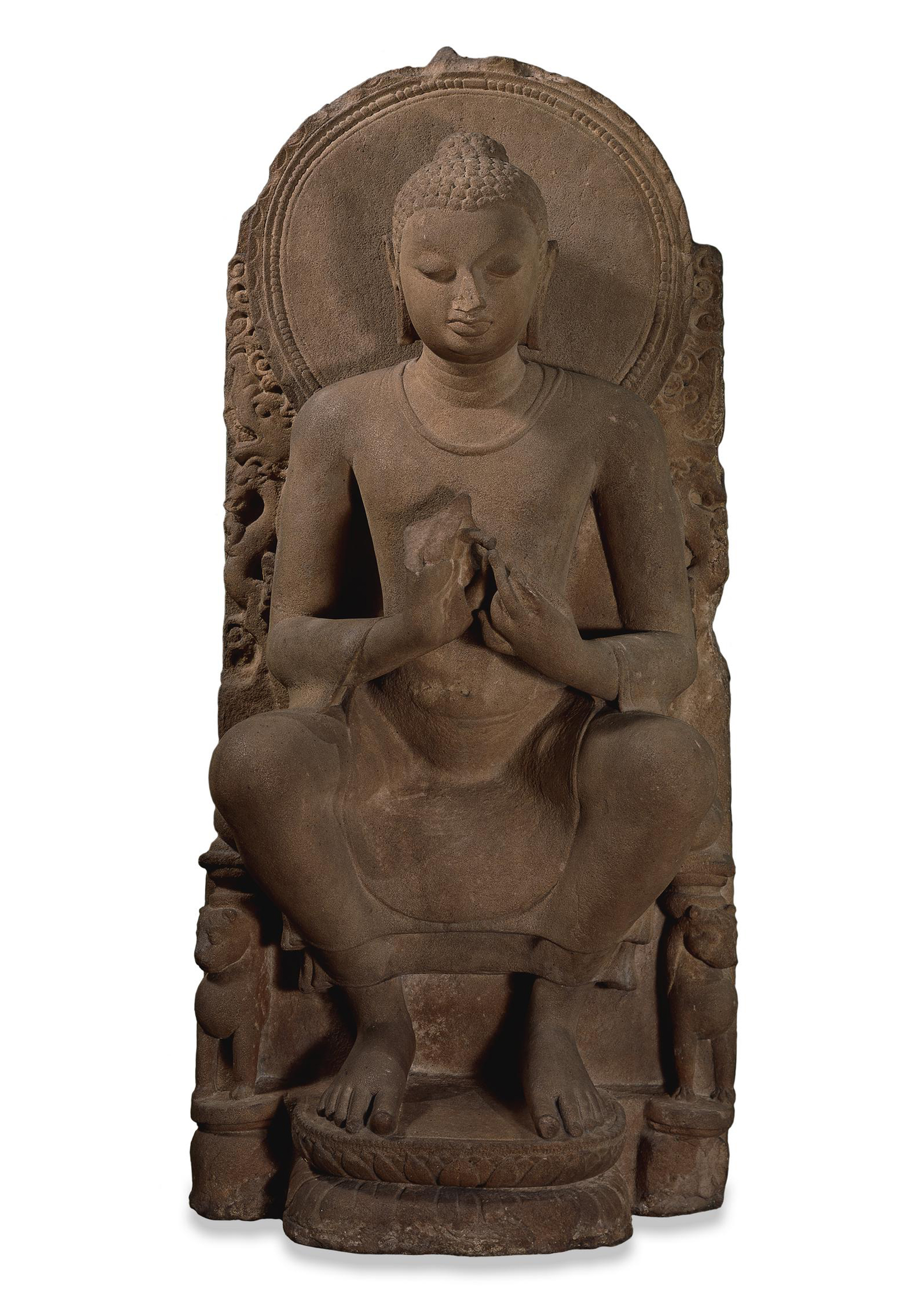 Photograph of a seated sandstone Buddha in dharmachakra mudra from Sarnath dated between the 5th to 6th century