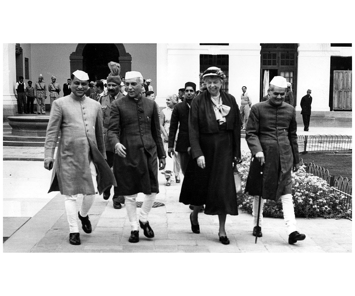 Black and white photograph of SN Sinha, Jawaharlal Nehru, Eleanor Roosevelt and GV Mavlankar at the Parliament House in New Delhi