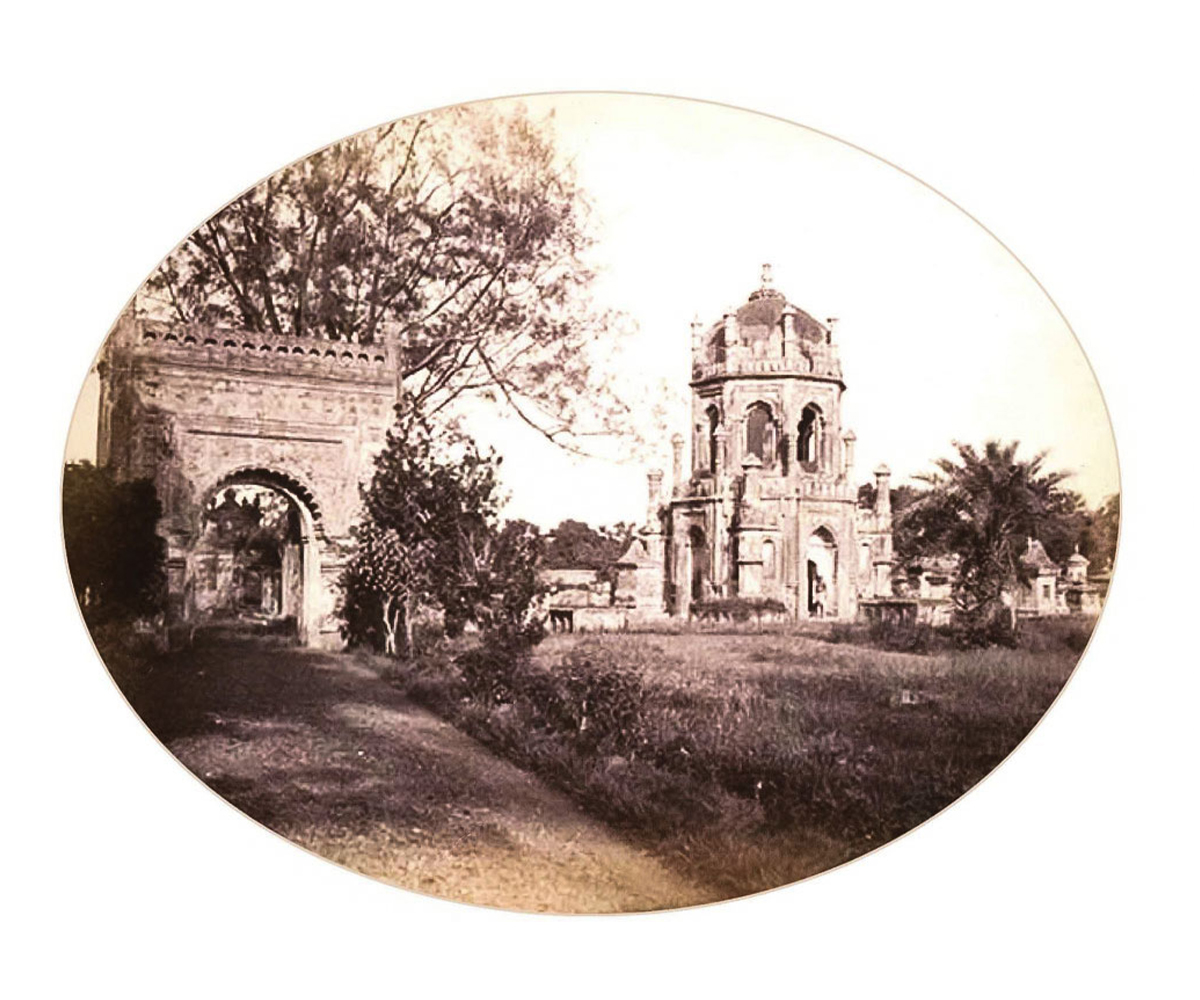 19th-century photograph showing Columbo Sahib tomb and an arched gateway