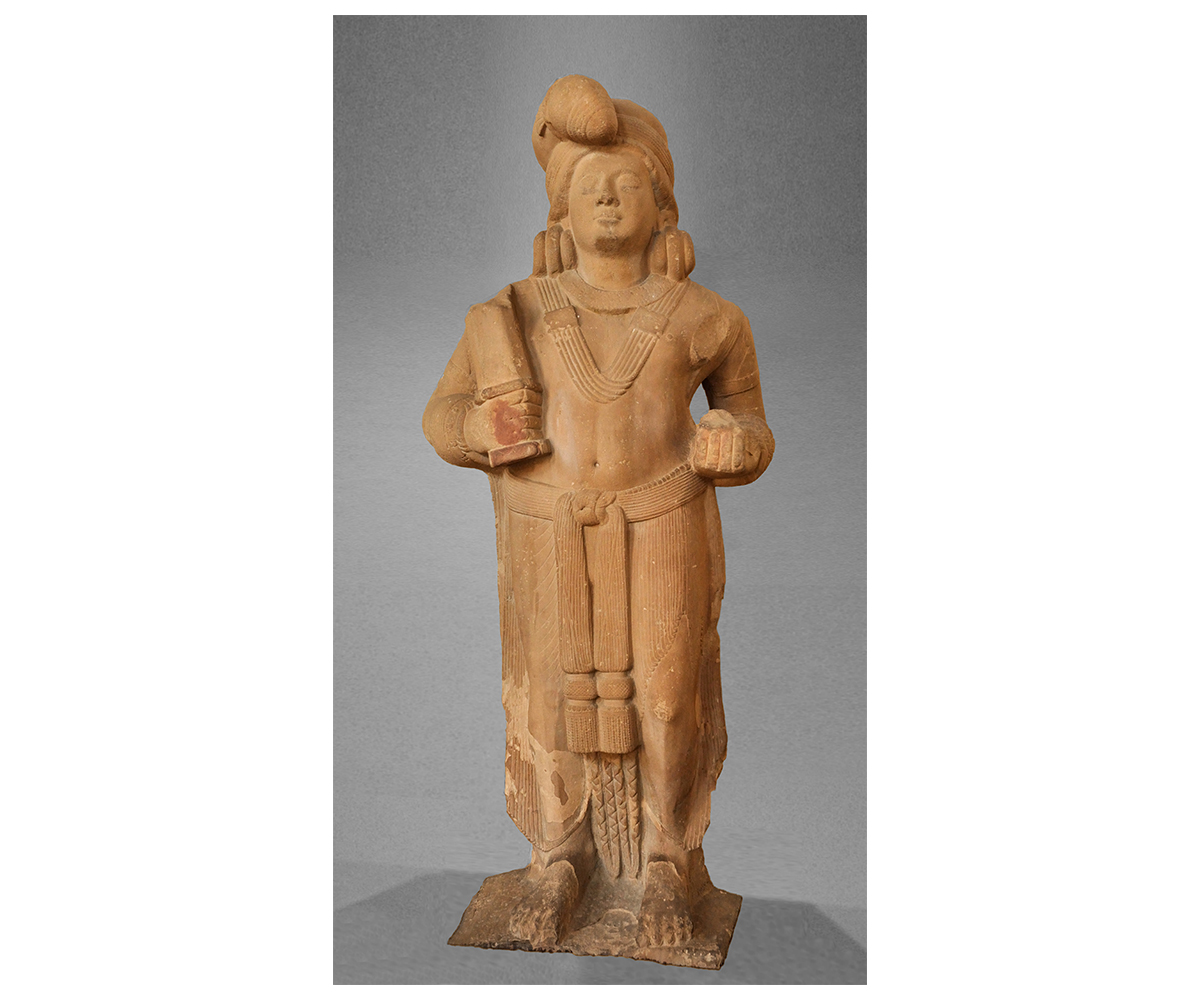 Photograph of Mudgarpani yaksha sculpture with a waist sash