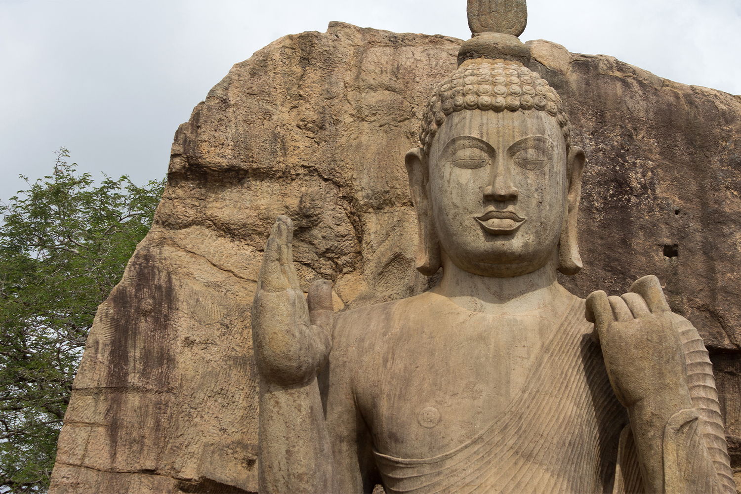 Close up photograph of the head of the Avukana Buddha statue