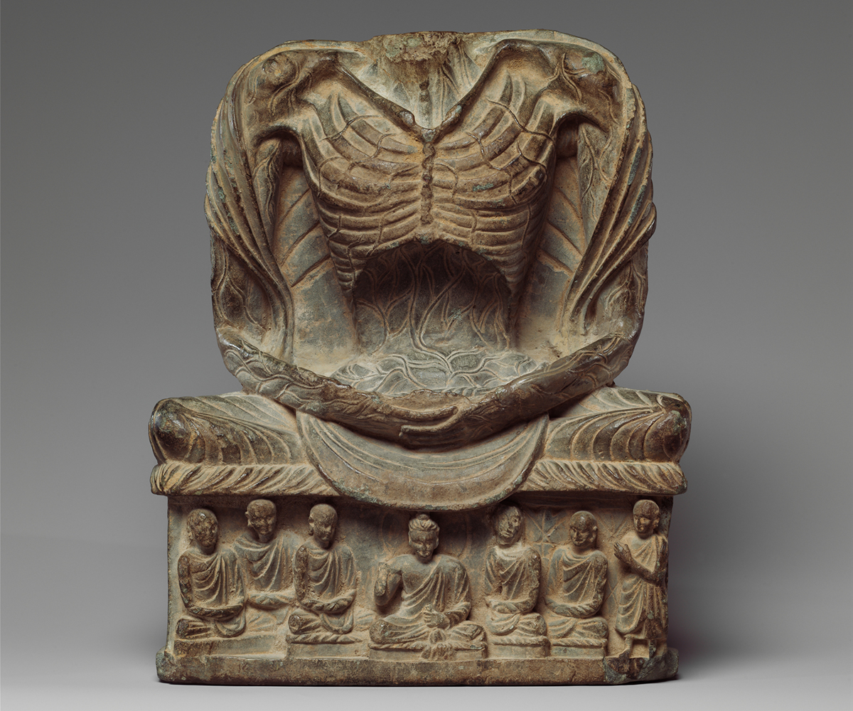 Photograph of a headless statue of fasting Buddha Shakyamuni