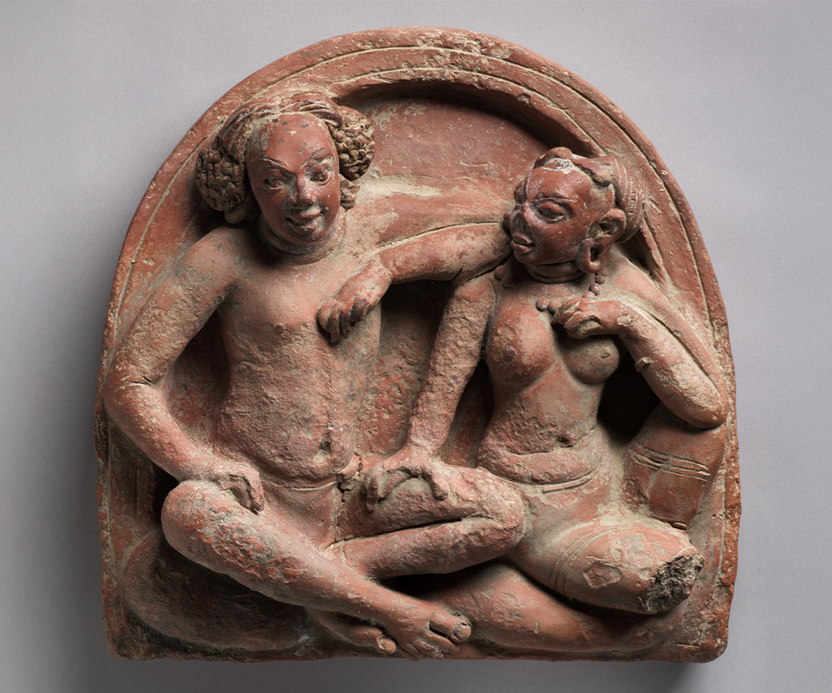 Gupta period terracotta sculpture showing a seated amorous couple or mithuna