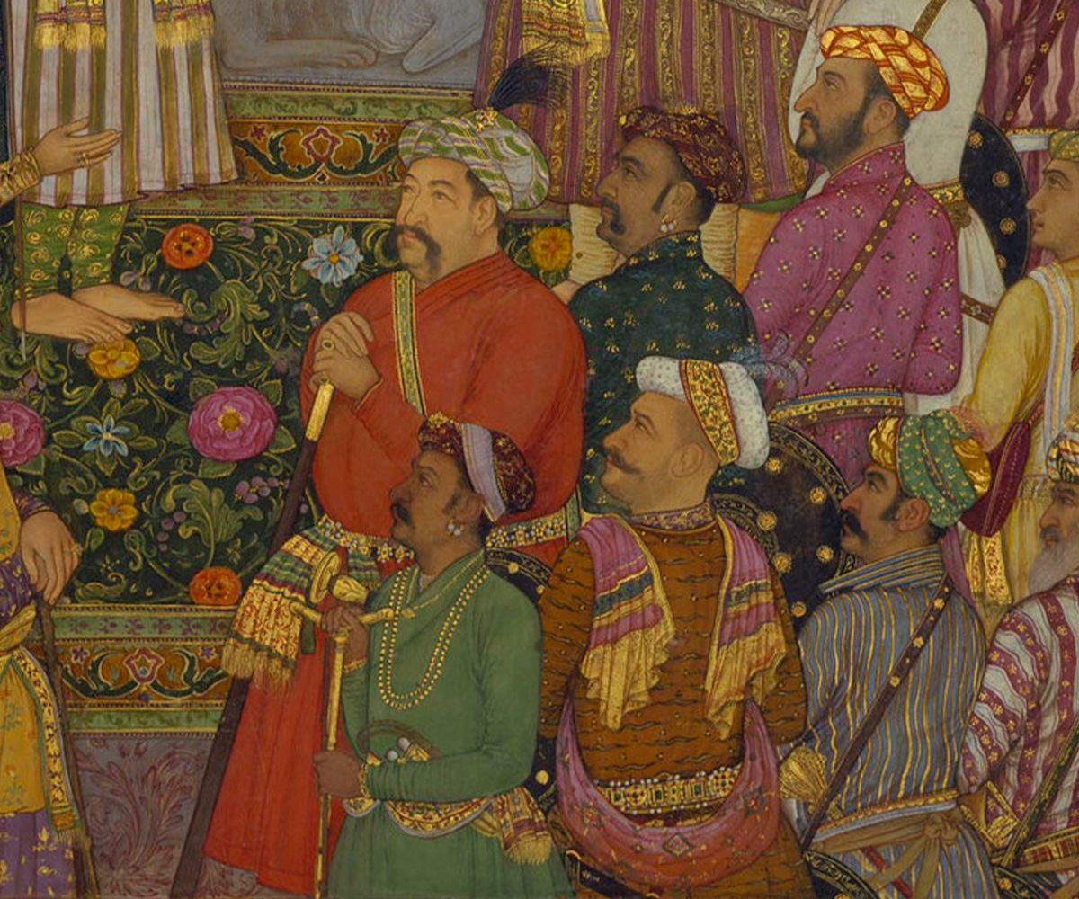 Mid-17th century watercolour painting by Payag showing a detail from a Padshahnama folio of a courtier in a green jama resting his hands on a zafar takiya