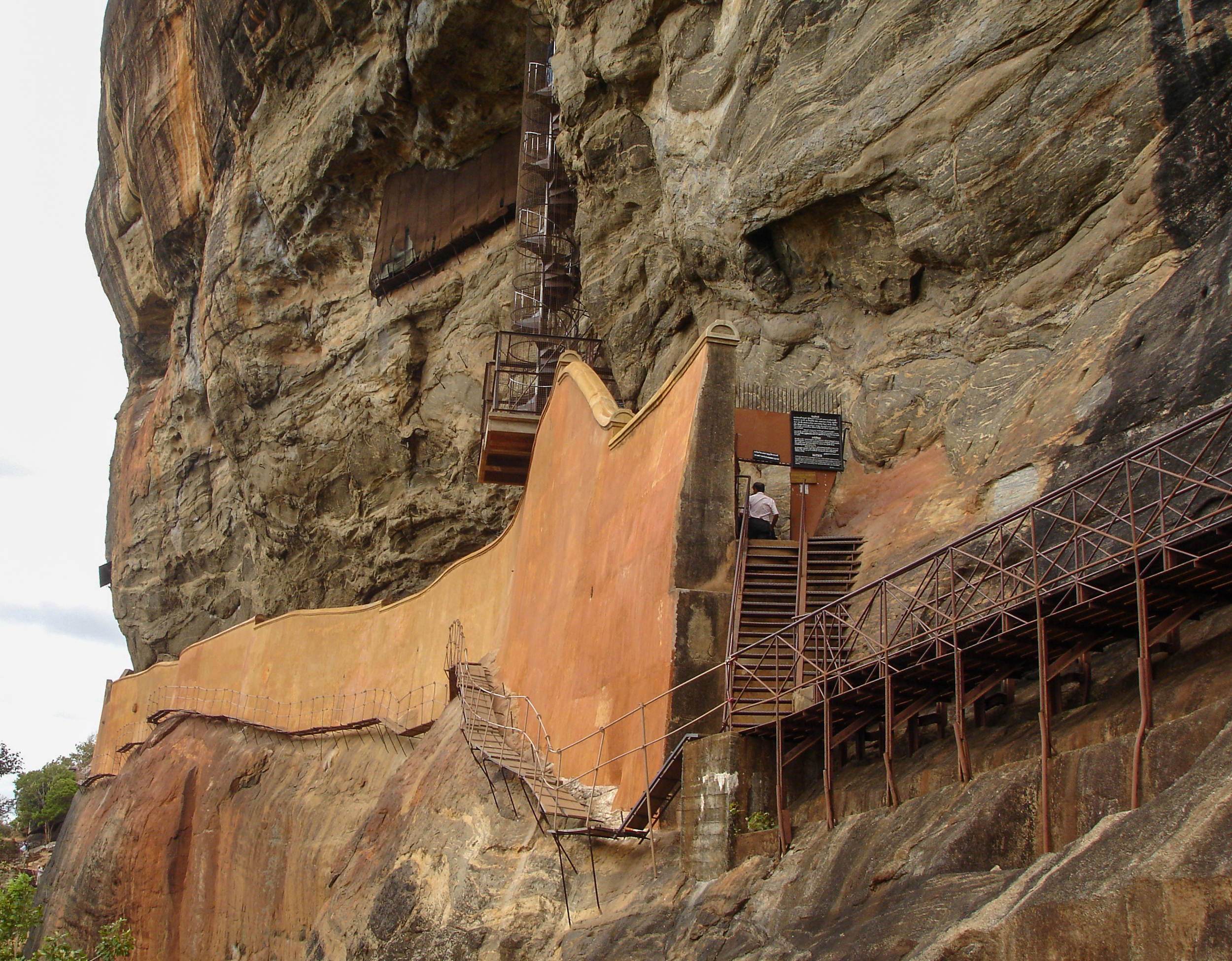 Photograph showing the mirror wall and spiral stairs leading to the frescoes