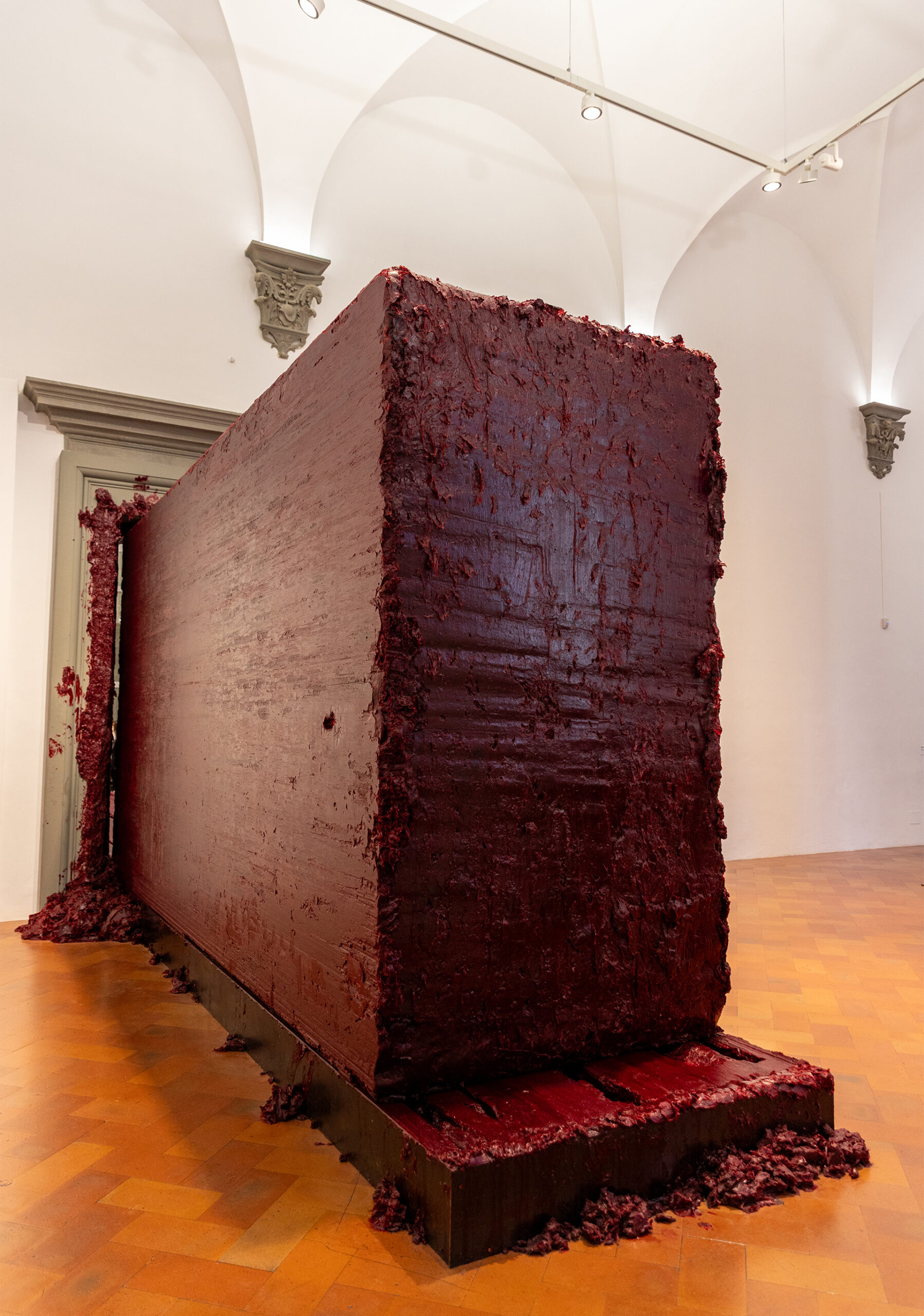 Photograph of the installation titled Svayambhu by Anish Kapoor