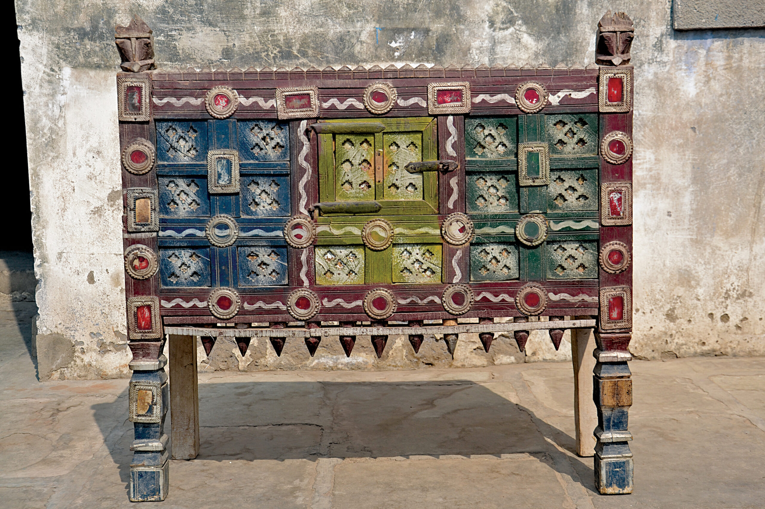 Photograph of a painted manjush