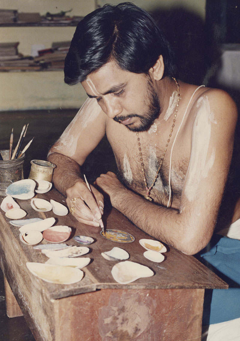 Archival photograph by TS Satyan of the artist Raghupati Bhatta of Mysore painting intricate ganjifas