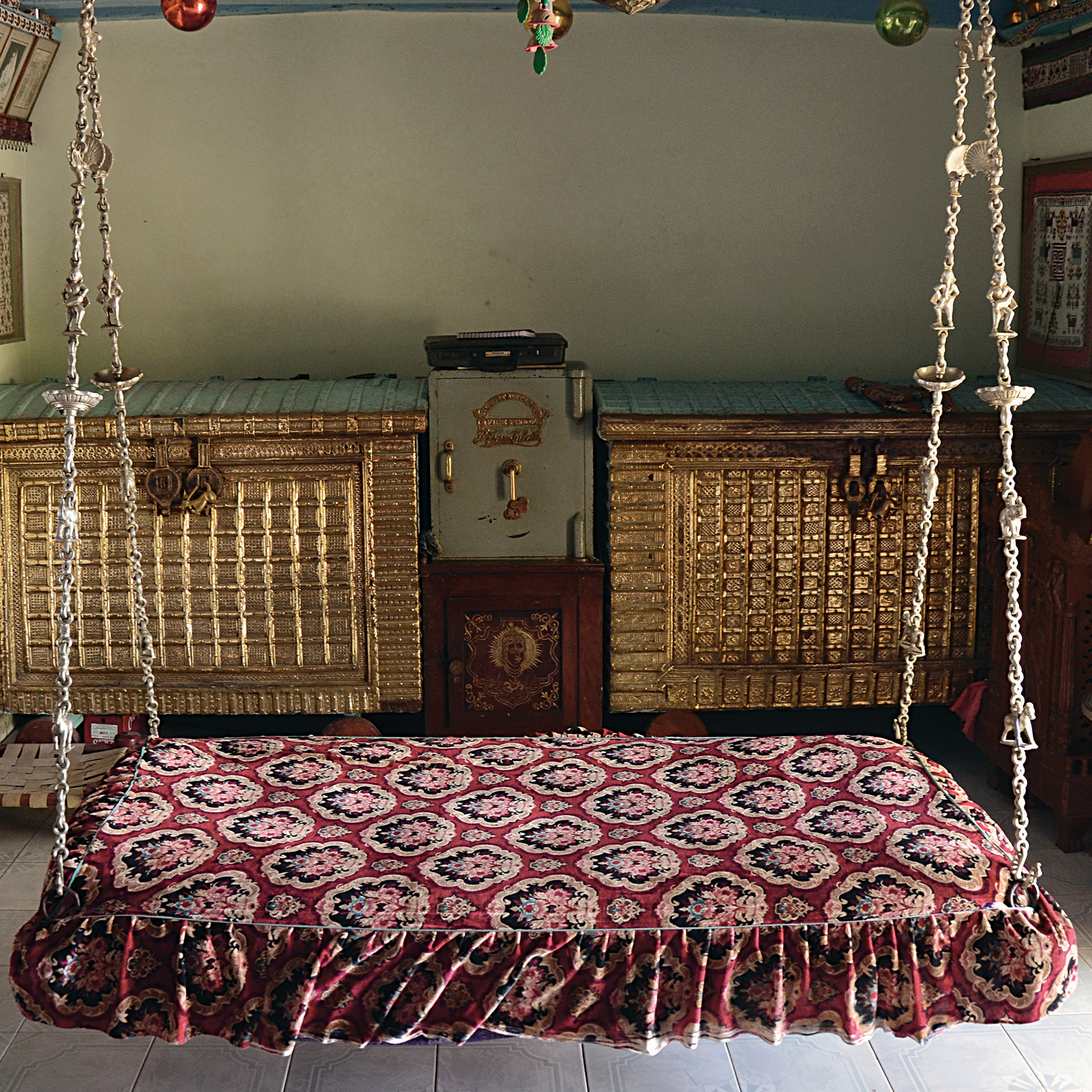 Photograph of a swing known as hindola with silver-plated chains