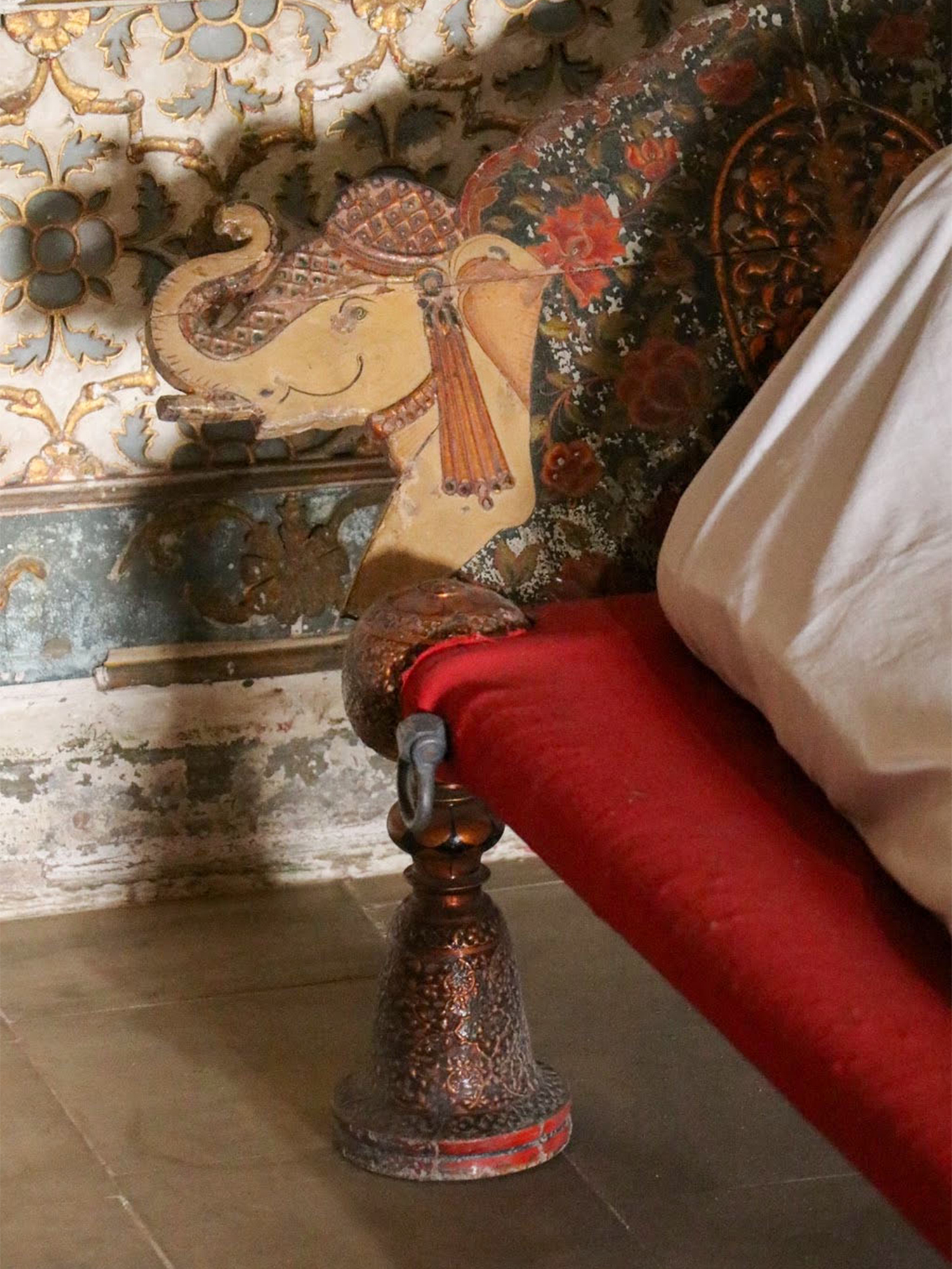 Detailed photograph of the headrest of a palang shaped like an elephant from Bikaner, Rajasthan