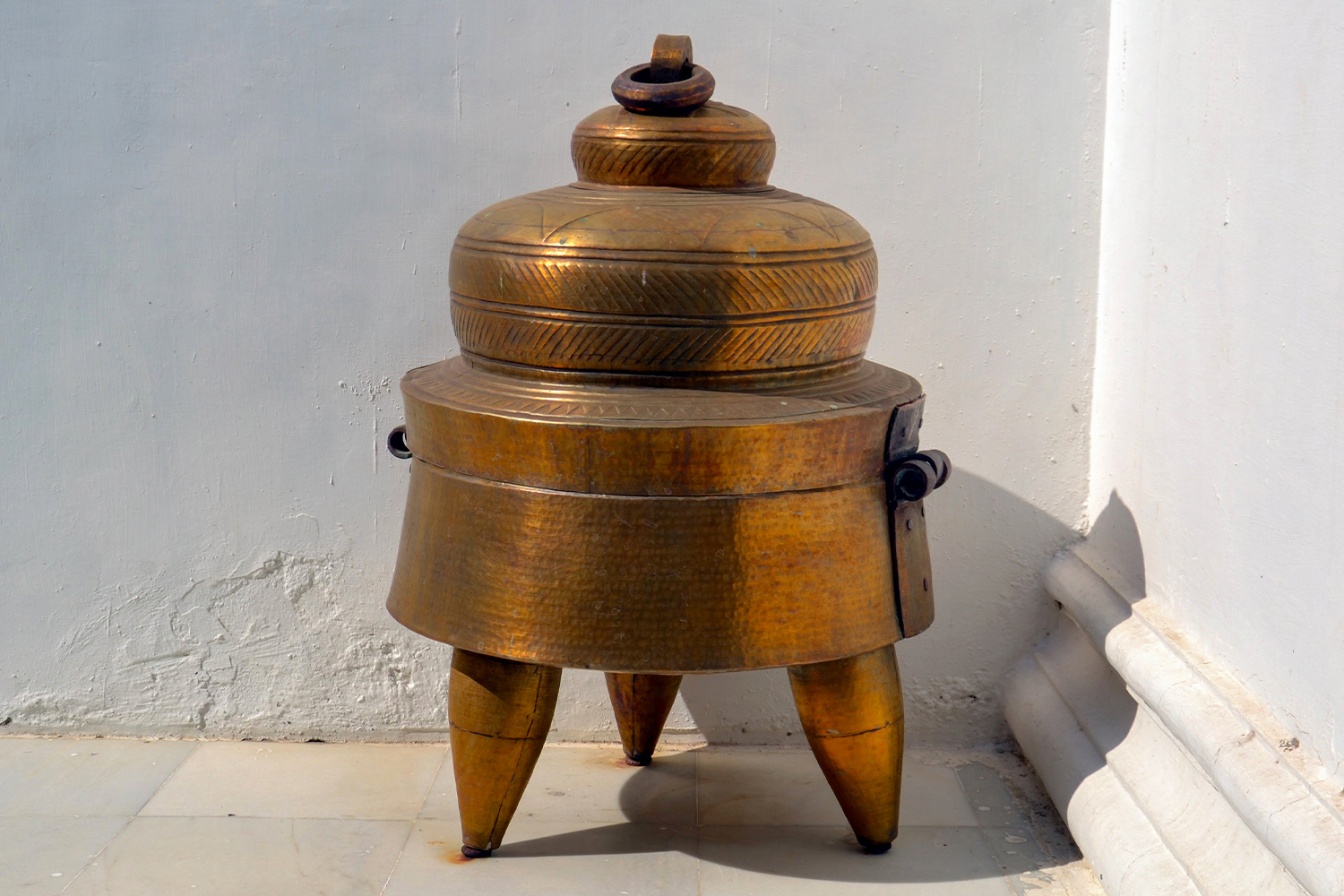 Photograph of a brass container called dablo from Gujarat