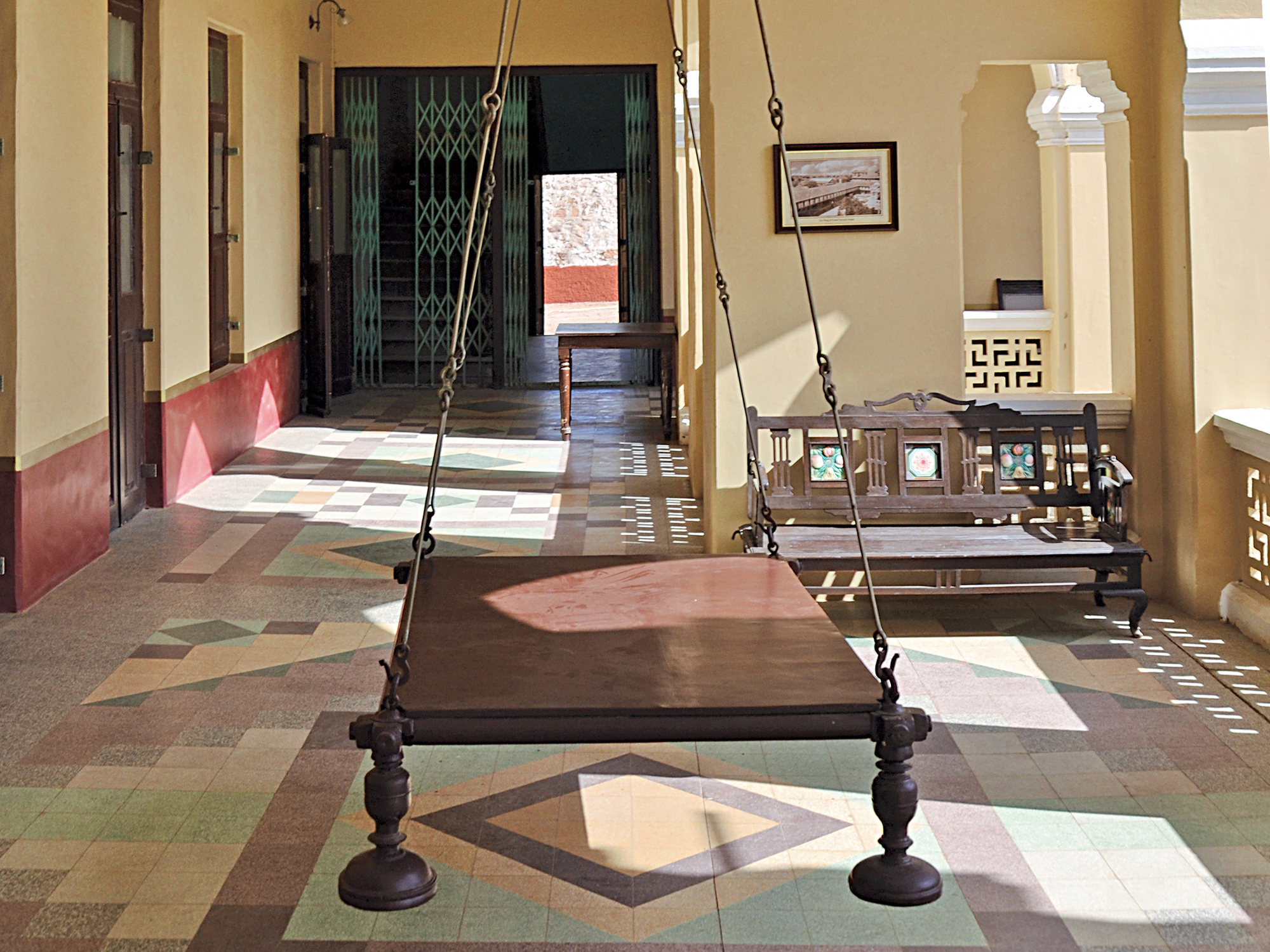Photograph of a dhorni retrofitted with wooden planks at the Ambika Niwas Palace