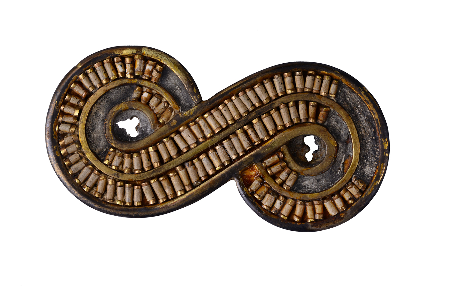 Photograph of a brooch made of gold & steatite from the Mature Harappan period