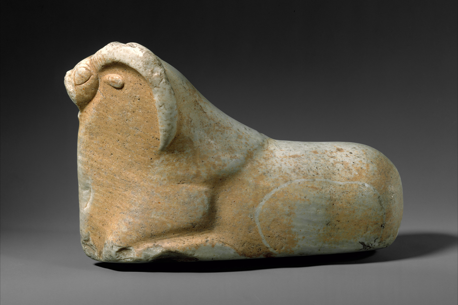 Photograph of a reclining mouflon made of marble from the Mature Harappan period