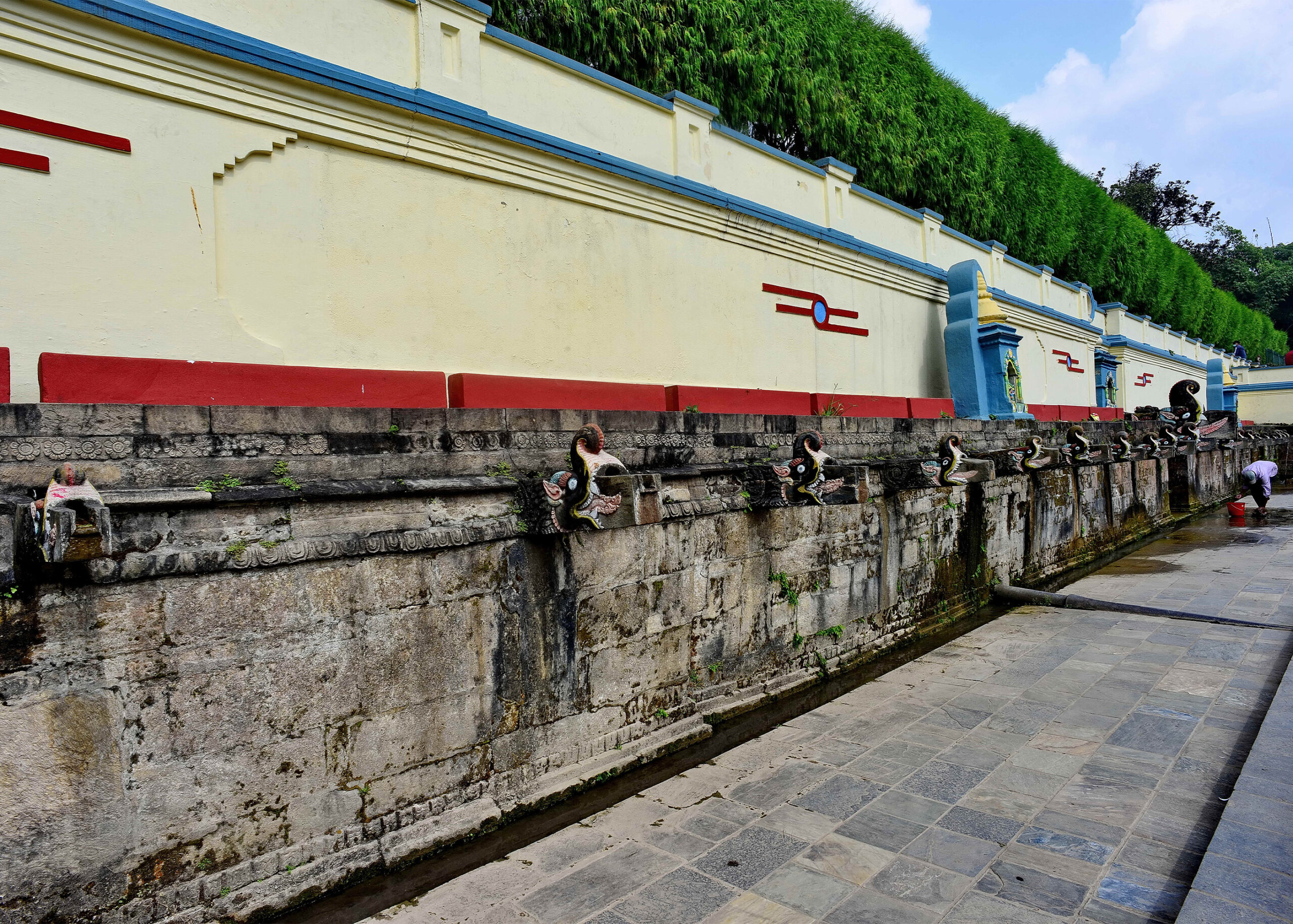 Photograph of the twenty two spouts known as the Baisdhara in Kathmandu, Nepal
