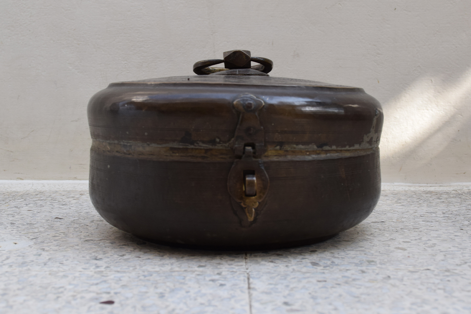 Photograph of a brass container from Rajasthan called katordaan
