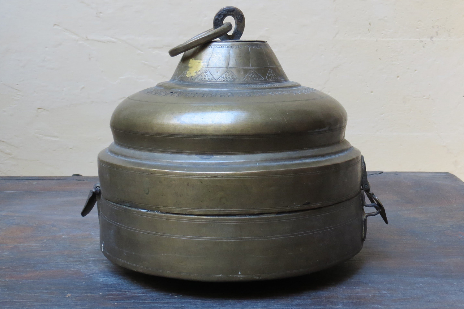 Photograph of a brass container from Rajasthan called talakhuta