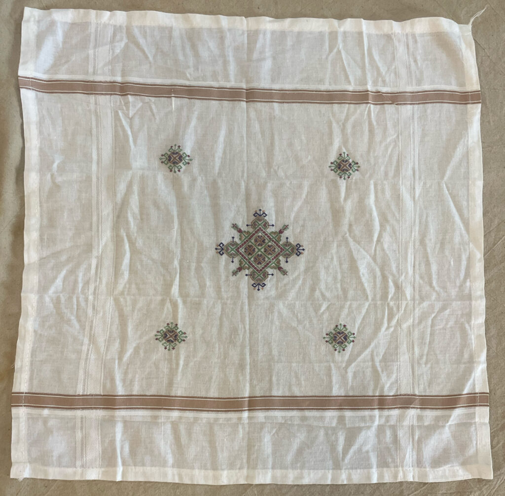 In the absence of time, girls embroider small suf motifs on ready-made handkerchiefs as dowry pieces in Sumrasar village, Gujarat. Courtesy the author