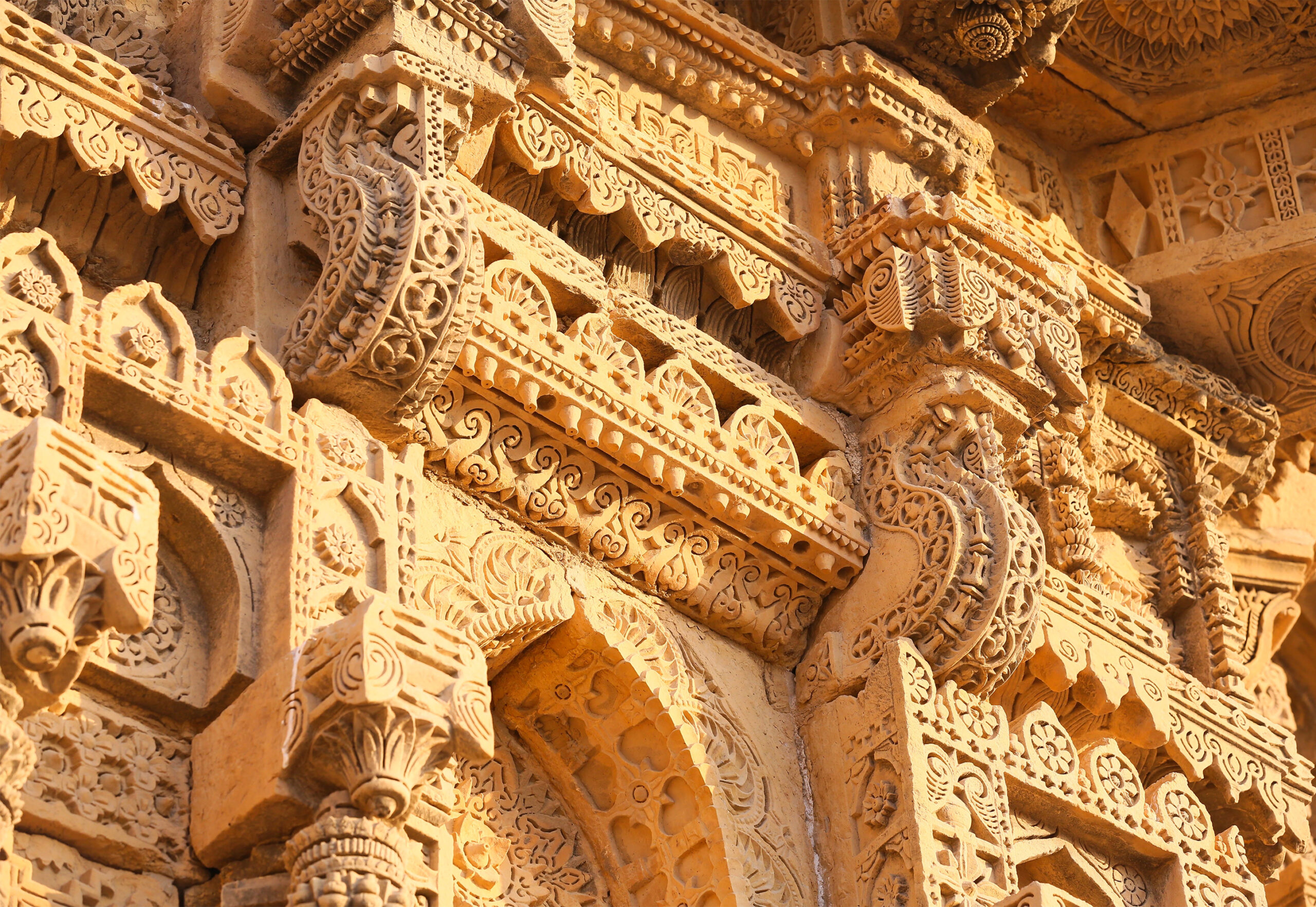 Photograph showing a detailed view of the carvings on the tomb of Nizamuddin II at Makli Necropolis