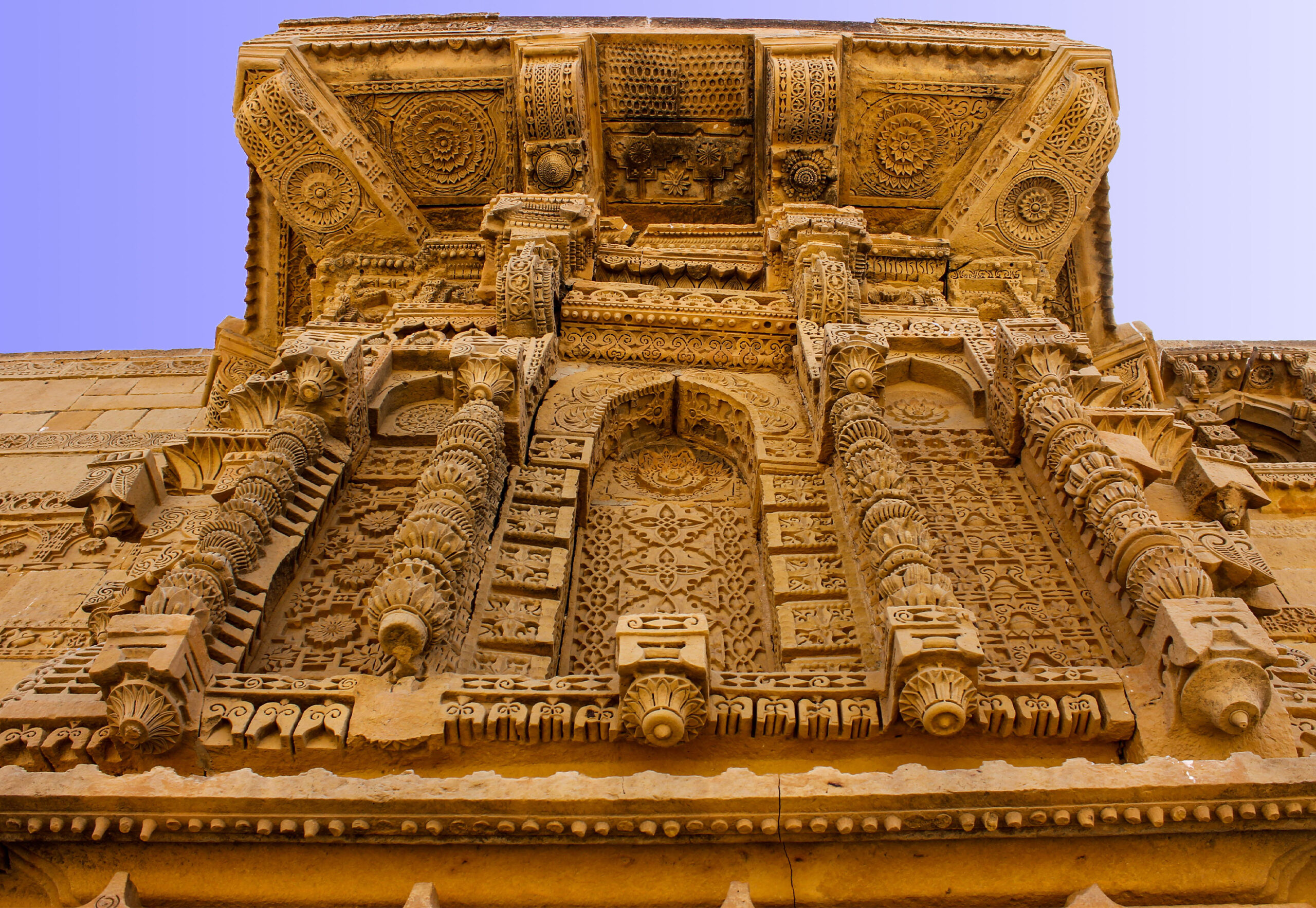 Photograph showing a detailed view of the carvings on the tomb of Nizamuddin II at Makli Necropolis